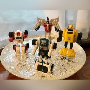 Lot TRANSFORMERS VW Bug Beetle Car Plane Truck Vehicle Tranforming Toys